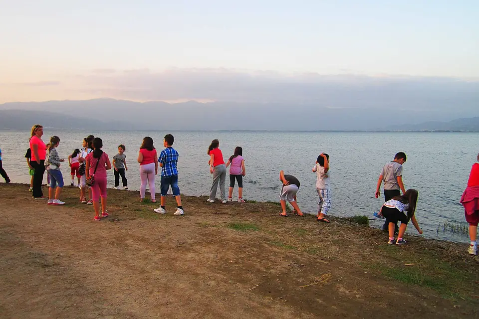 Children play beside Dojran lake