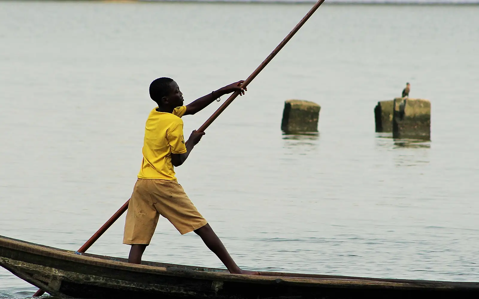 Boy fishing on Lagos Lagoon