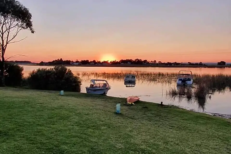 Reed clearing and power boats, Ramsar Wetlands Area, Clayton Bay Caravan Park