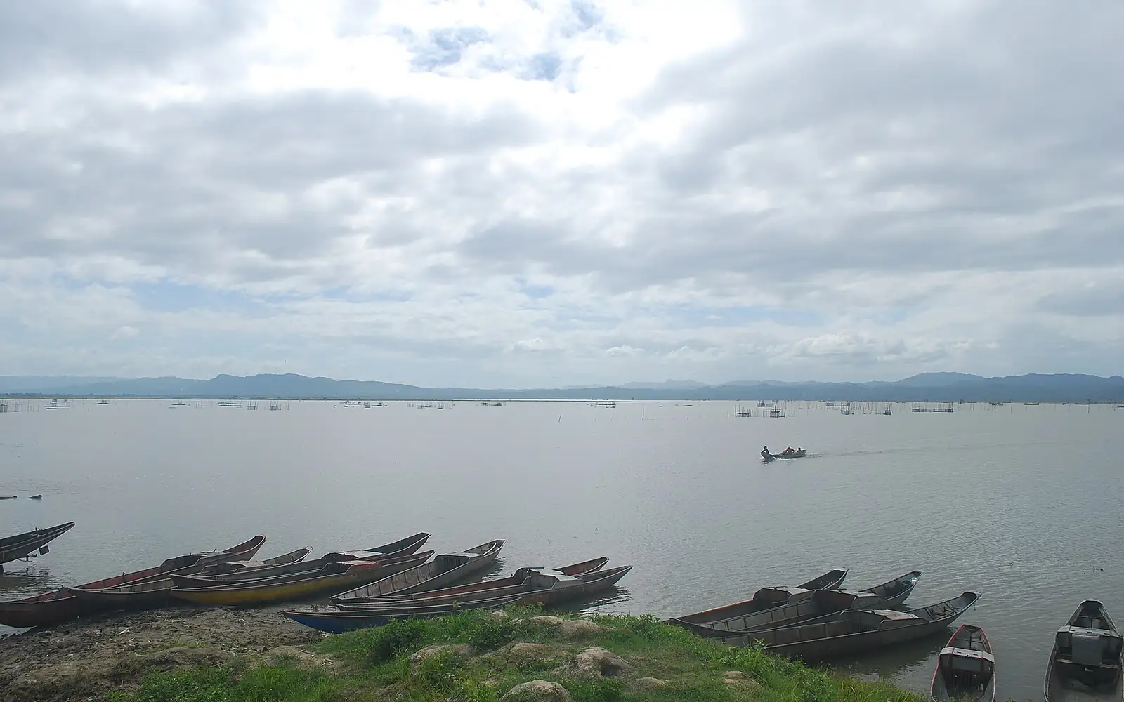 Boats at lake bato