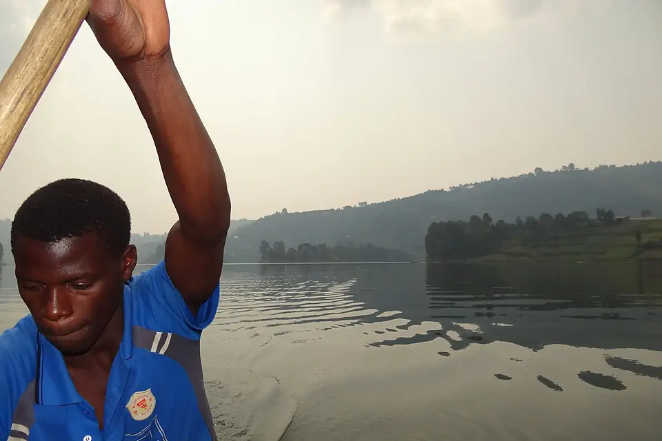 Boatsman Rows on Lake Bunyonyi - Southeastern Uganda