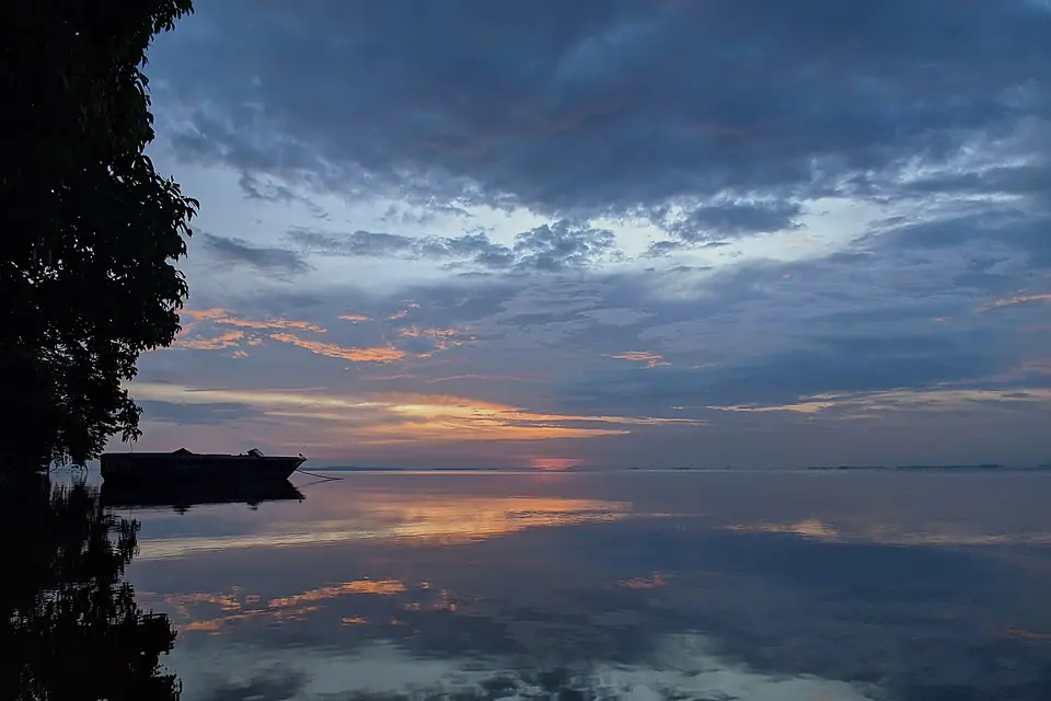 Mirror-like water during Lake Nabugabo sunrise