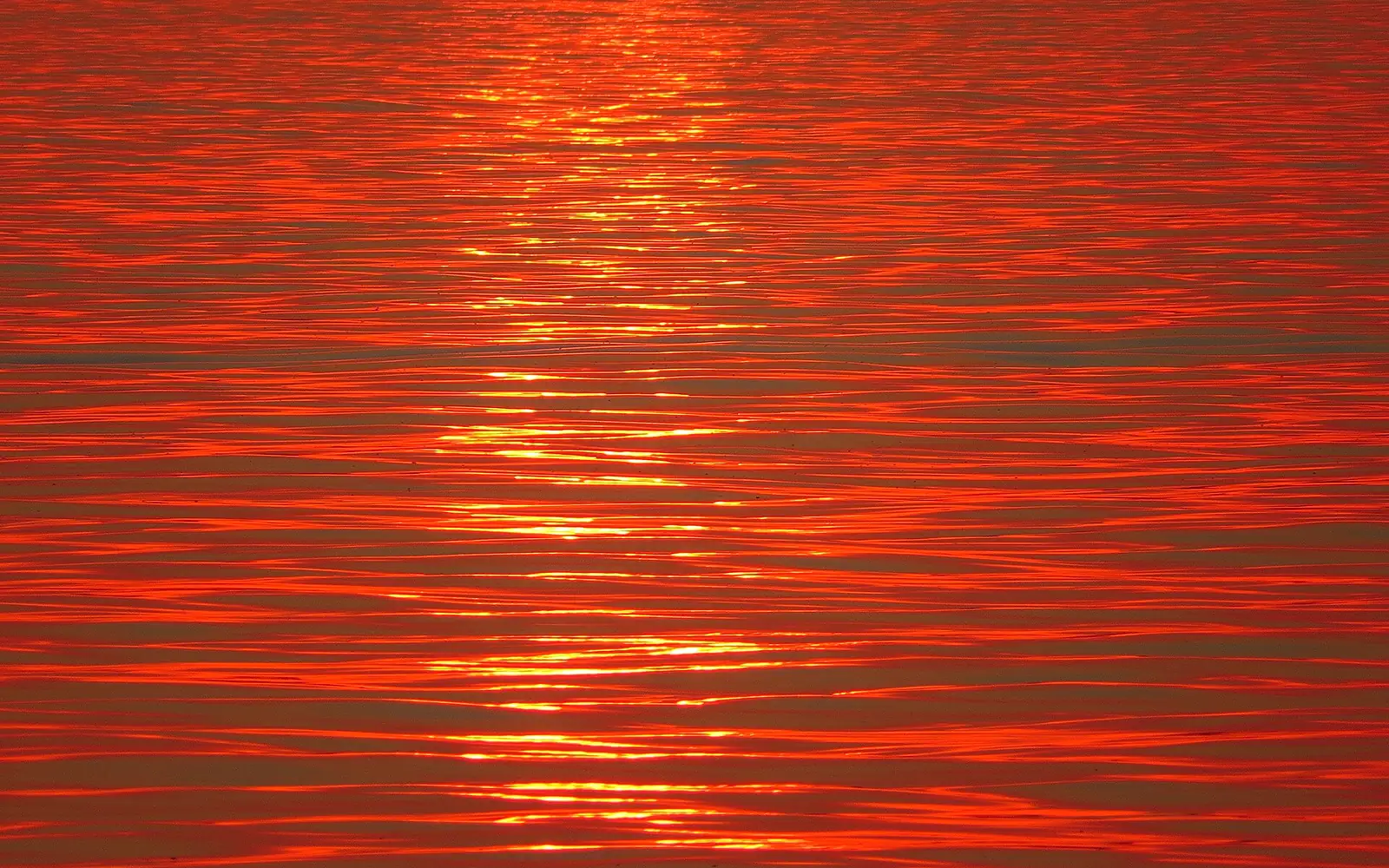 "Liquid copper" sunset at Lake Siutghiol